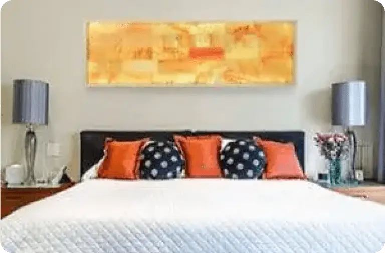 Salt wall panel installed above a bed