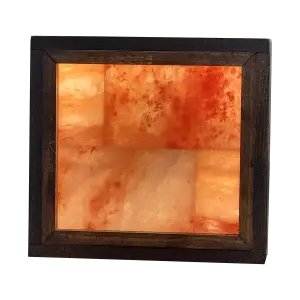1x1 square LED Himalayan salt wall panel glowing warm pink in modern spa room